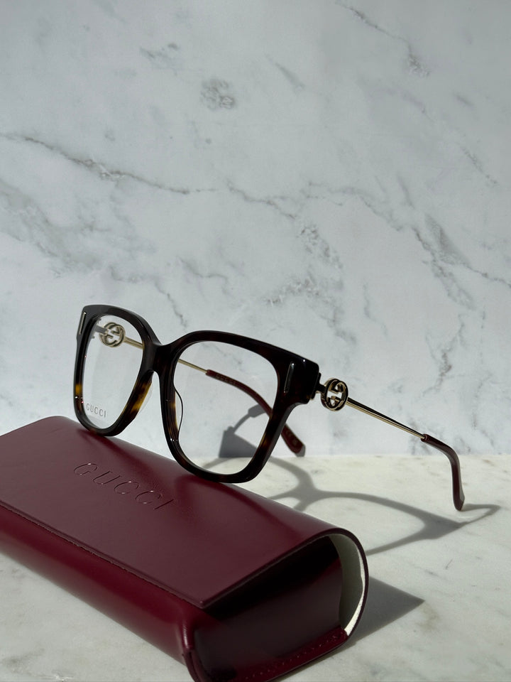 Gucci Havana brown eyeglasses, front-left view with clear lenses