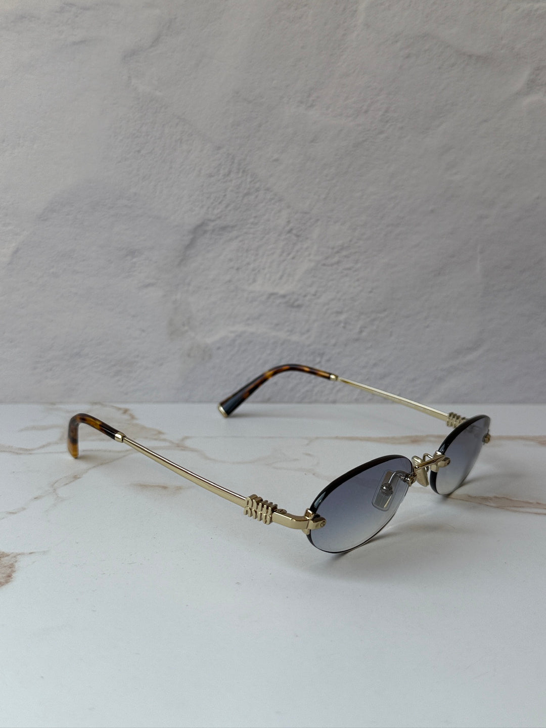 Miu Miu MU A54S Gold Blue Oval Rimless Sunglasses