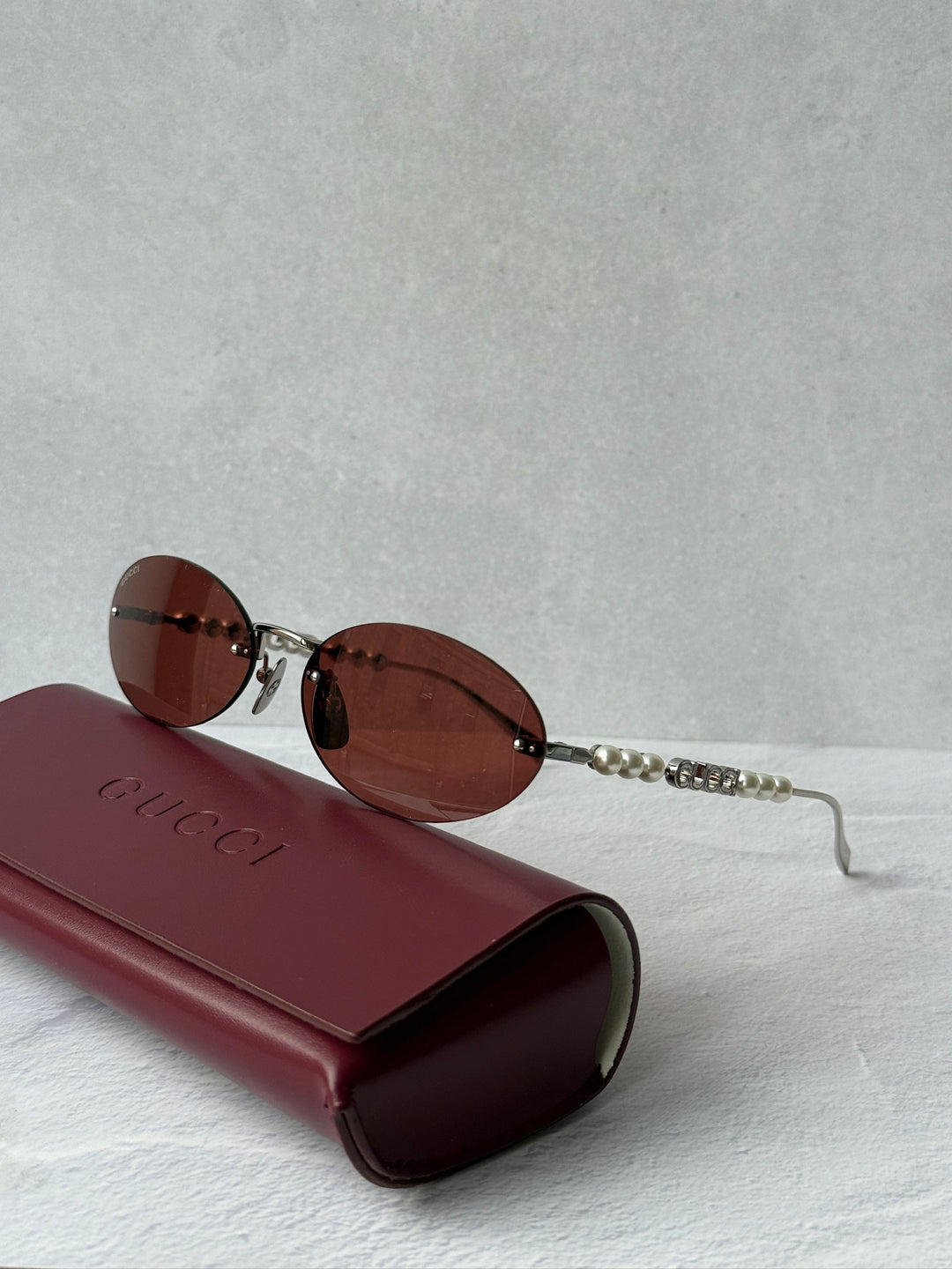 Gucci GG1922S Rimless Oval Pearl Sunglasses in Silver Red