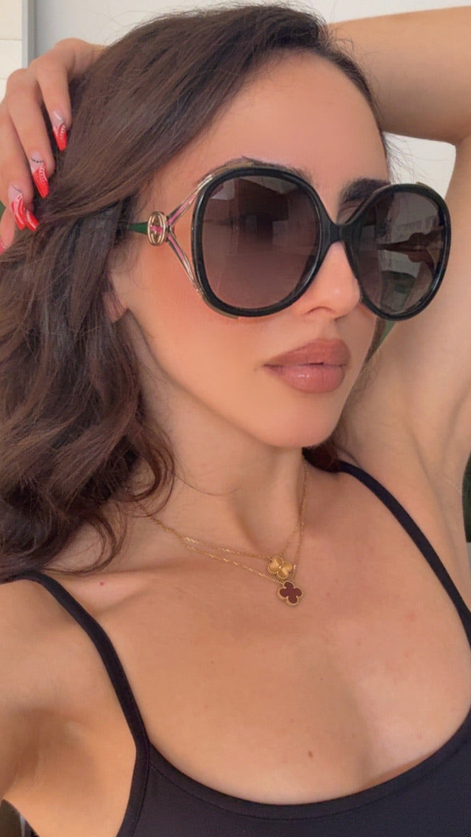 Gafas de sol con corte ovalado Gucci GG0226SK en negro rosa