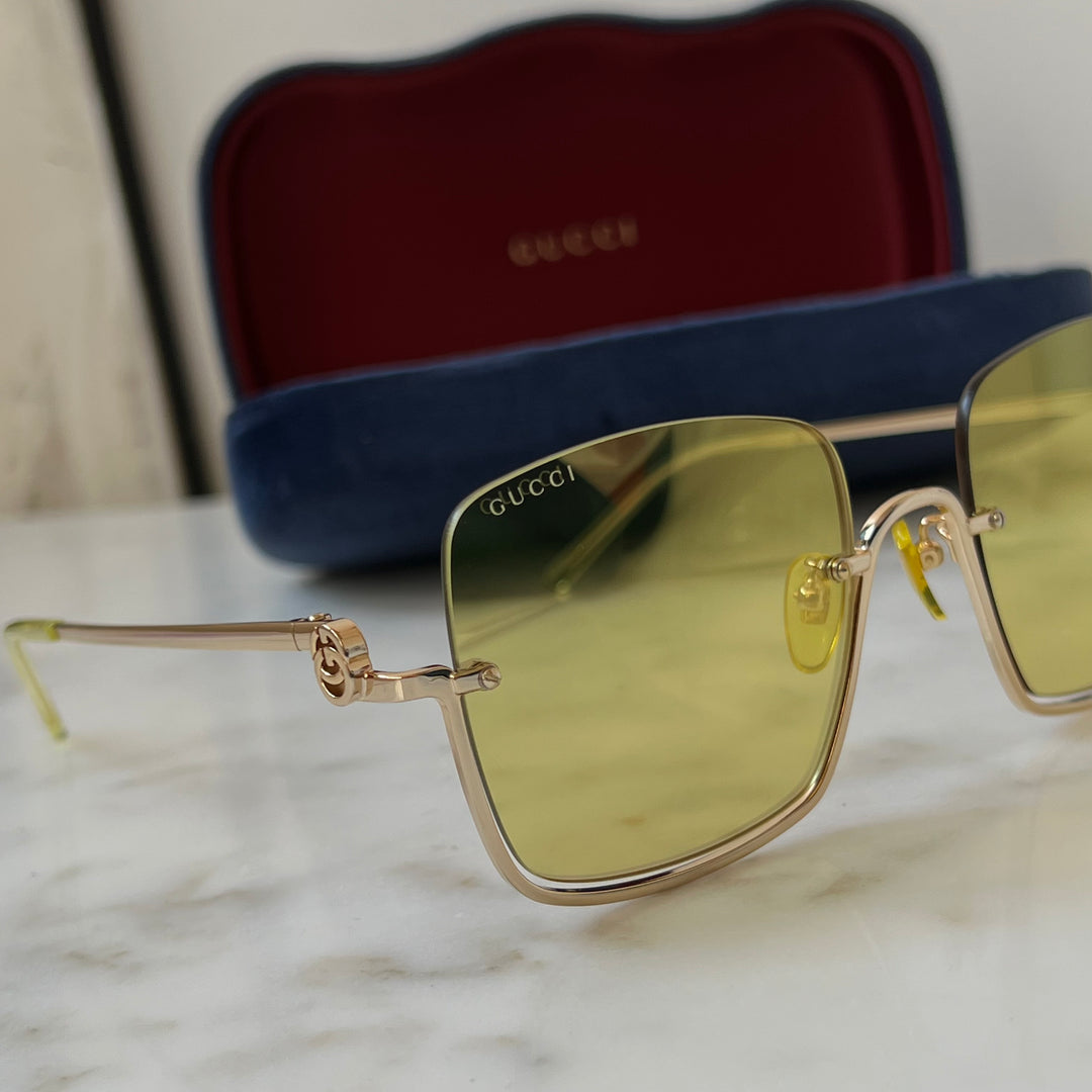 Gucci GG1279S Rimless Square Sunglasses in Gold