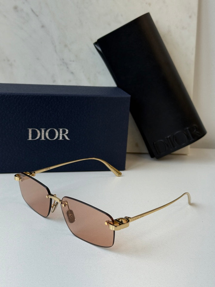 Dior rimless sunglasses, tinted pink lenses and gold-tone frame