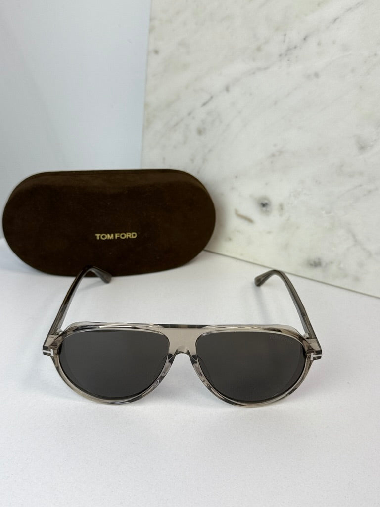 Aviator sunglasses with dark lenses and silver frame with hard case