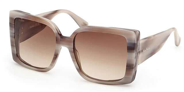 Oversized grey horn sunglasses with wide frames and gradient brown lenses