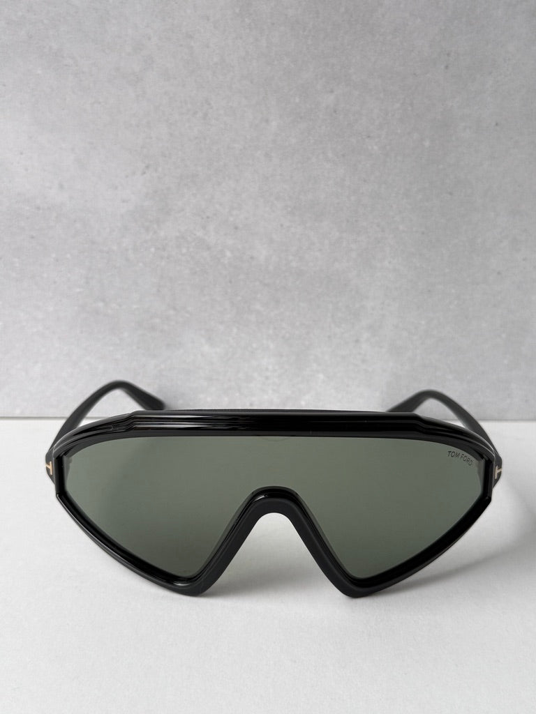 Black shield-style sunglasses with dark green lenses and wide frame