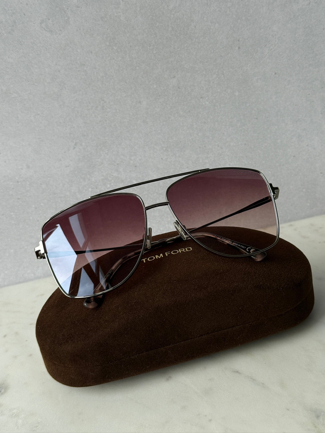 Palladium aviator sunglasses with maroon gradient lenses and metal bridge