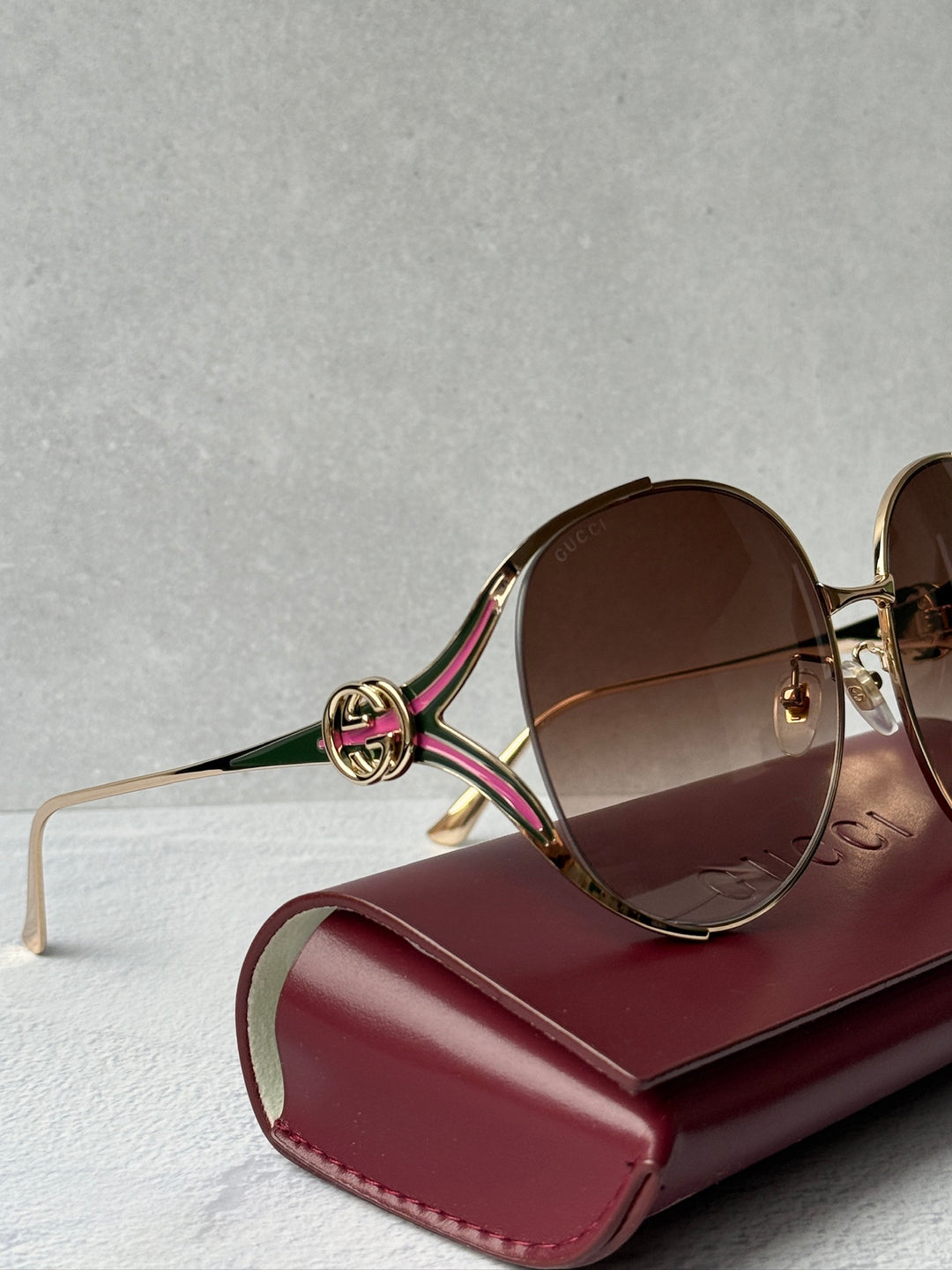 Gucci GG0225S Oversized Cutout Metal Sunglasses in Rose Gold