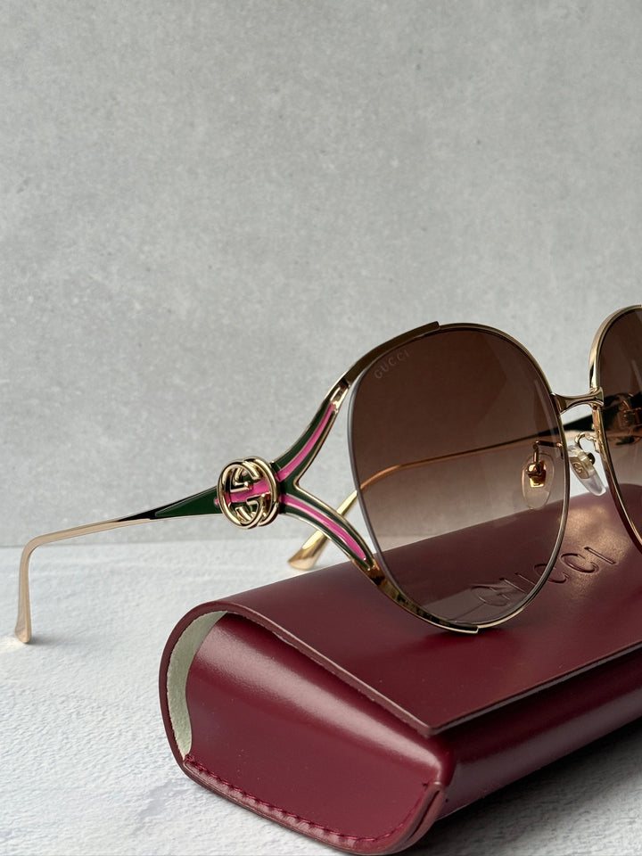 Gucci GG0225S Oversized Cutout Metal Sunglasses in Rose Gold