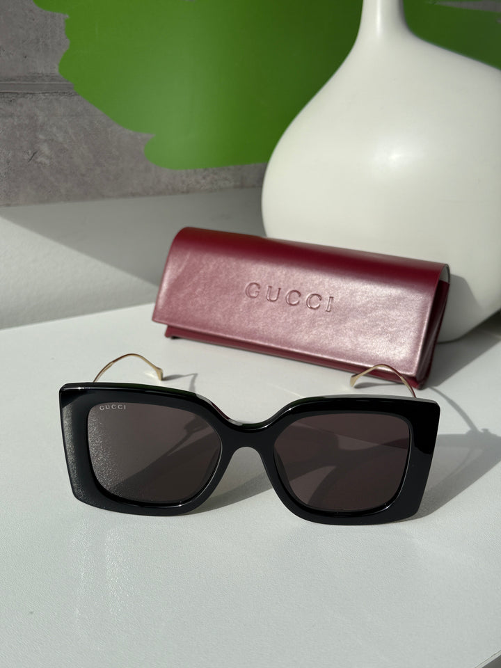Gucci GG1257S Gafas de sol redondeadas con lentes marrones y rojos