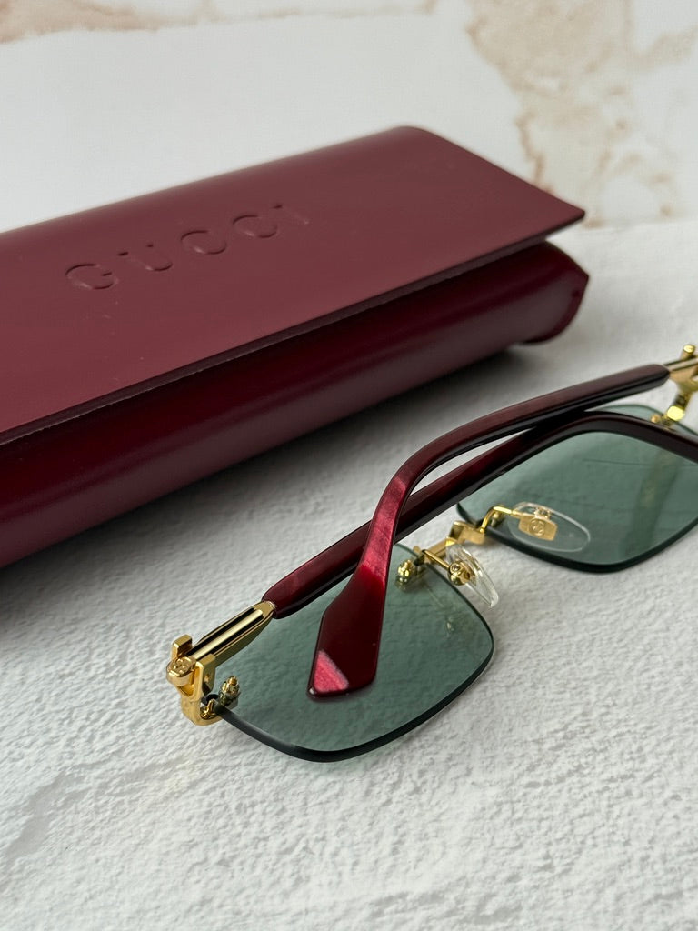 Gucci GG1221S Green Tinted Rimless Sunglasses