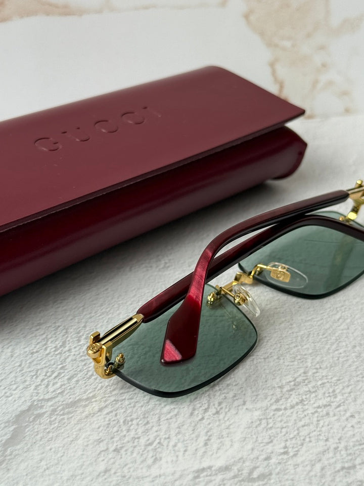 Gucci GG1221S Green Tinted Rimless Sunglasses