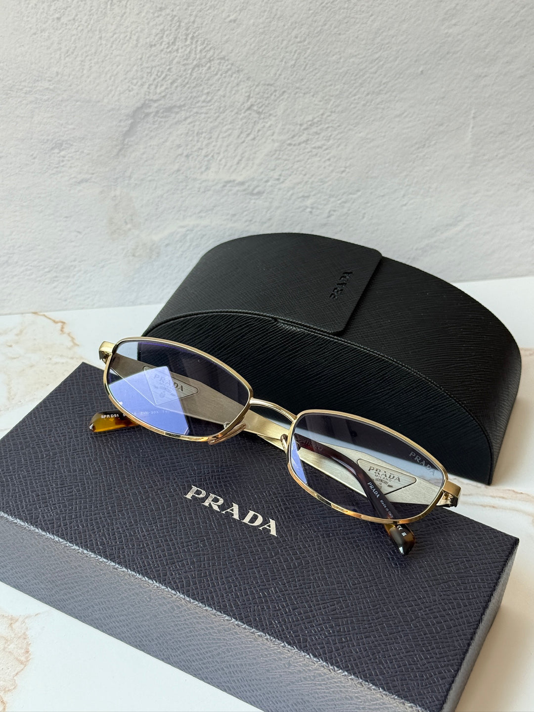 Prada PR D51S Metal Oval Sunglasses in Gold Blue