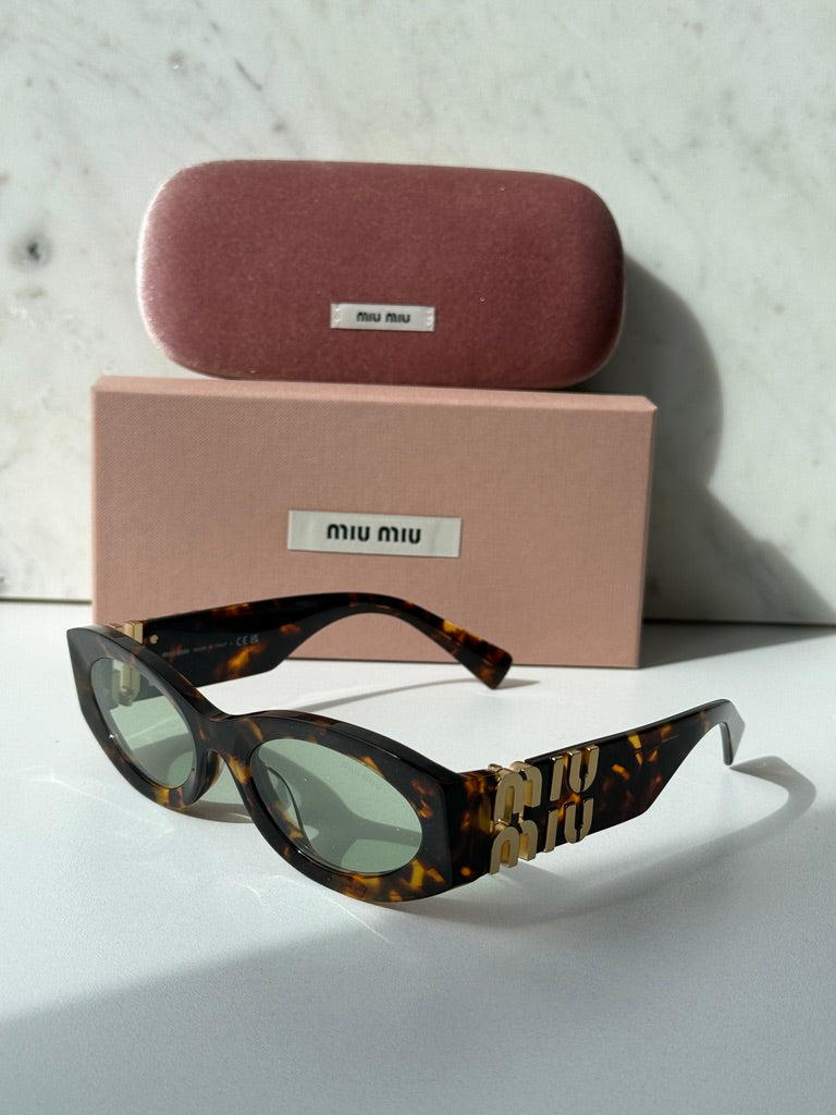 Miu Miu MU11WS Honey Havana Oval Sunglasses