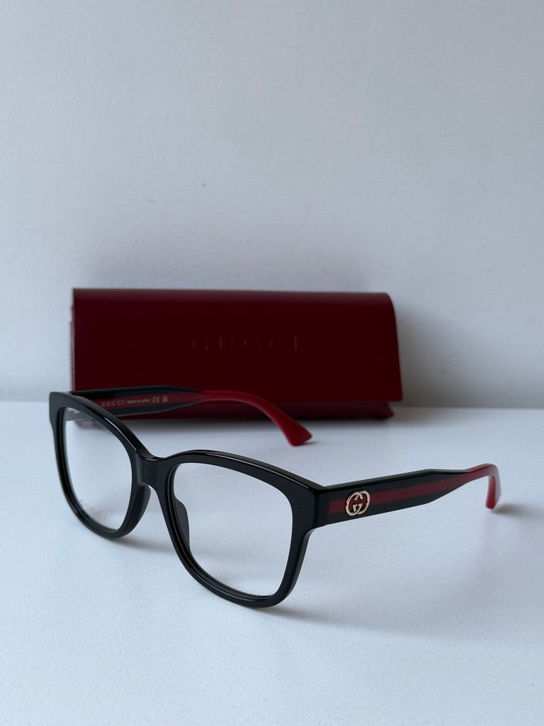 Monturas de anteojos Gucci GG0038ON con patas a rayas negras