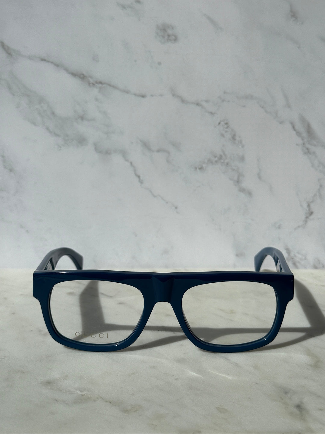 Gucci blue rectangular eyeglass frames with clear lenses, front view