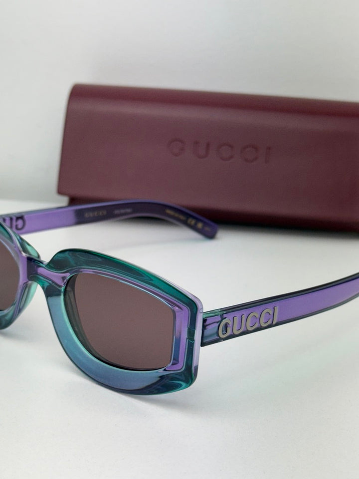 Gucci GG1719S Oval Sunglasses in Transparent Violet