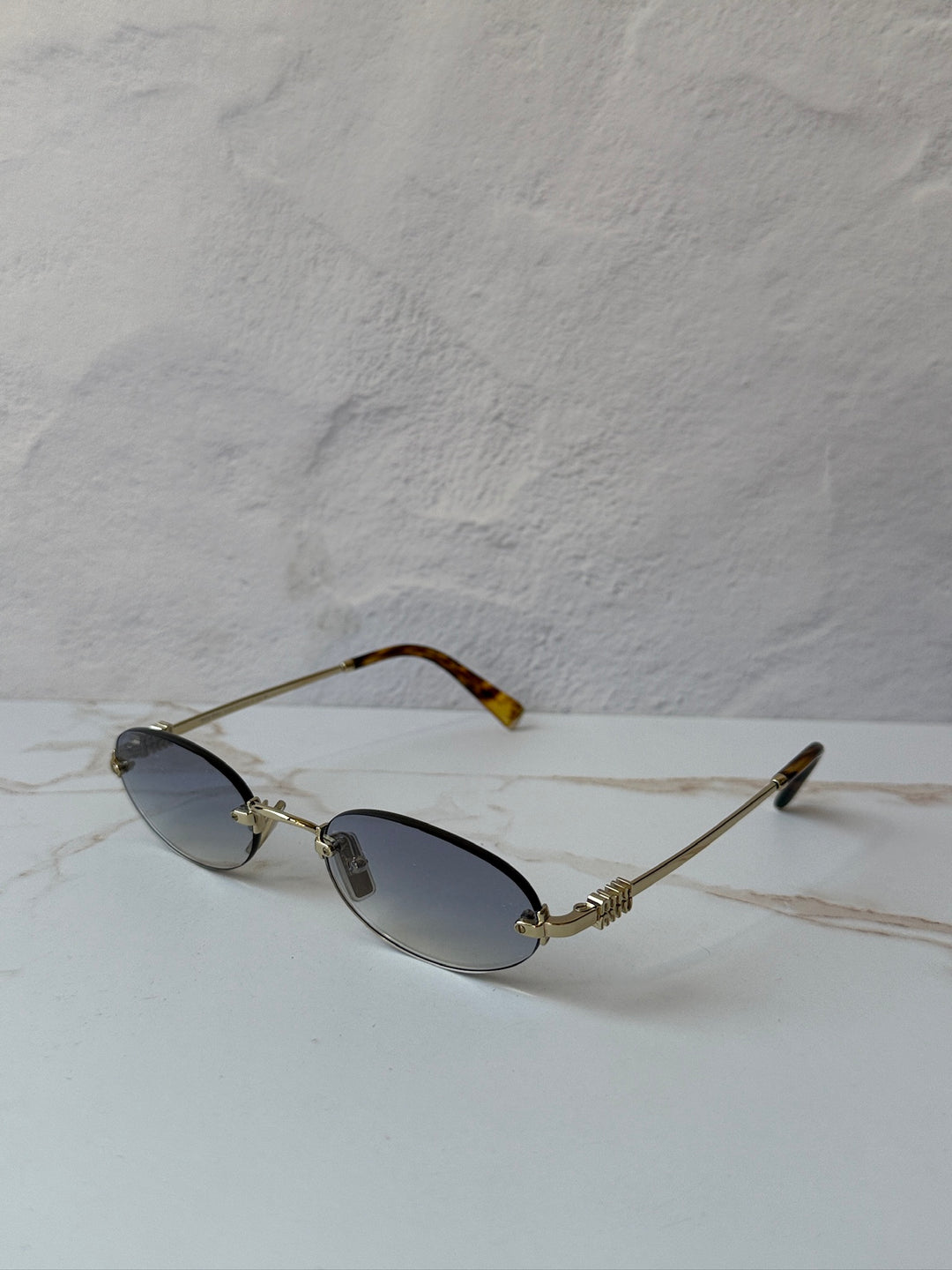 Miu Miu MU A54S Gold Blue Oval Rimless Sunglasses