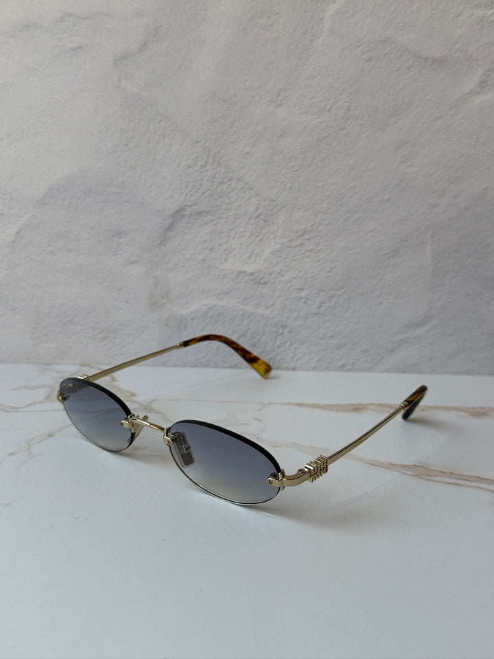 Miu Miu MU A54S Gold Blue Oval Rimless Sunglasses