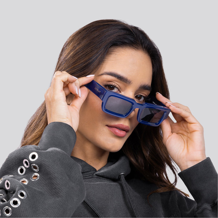 Blue square sunglasses with dark lenses and Off-White logo on the temple arms.
