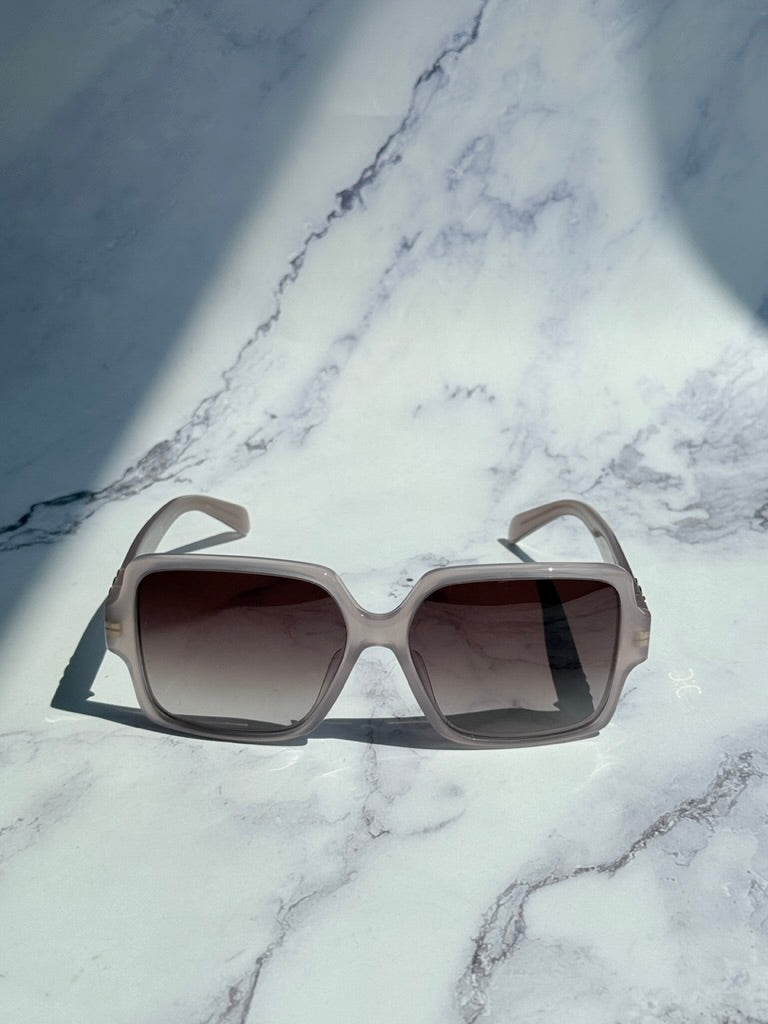 Taupe square sunglasses with dark tinted lenses, front view, wide frame