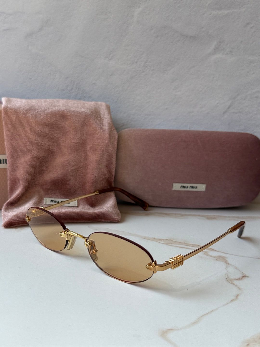 Miu Miu MU A54S Brass Orange Oval Rimless Sunglasses