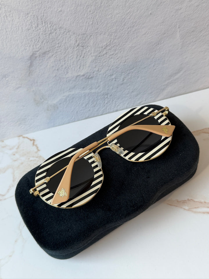 Gucci GG0113S Blind For Love Gafas de sol redondas negras