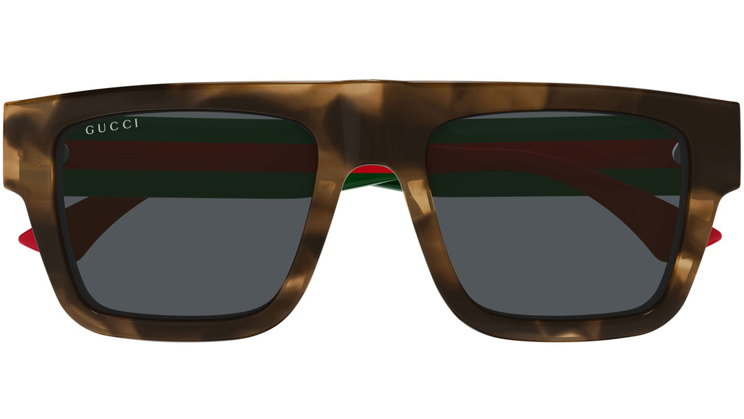 Unisex Gucci sunglasses with brown frames, dark lenses, red and green stripe temples