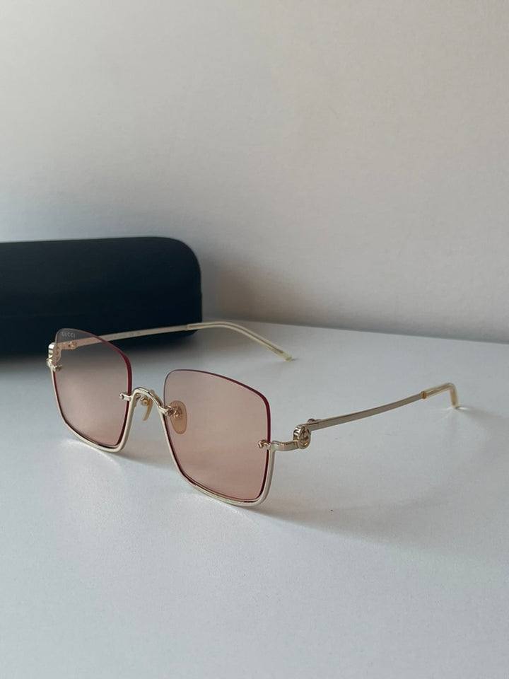 Gafas de sol cuadradas sin montura en dorado Gucci GG1279S