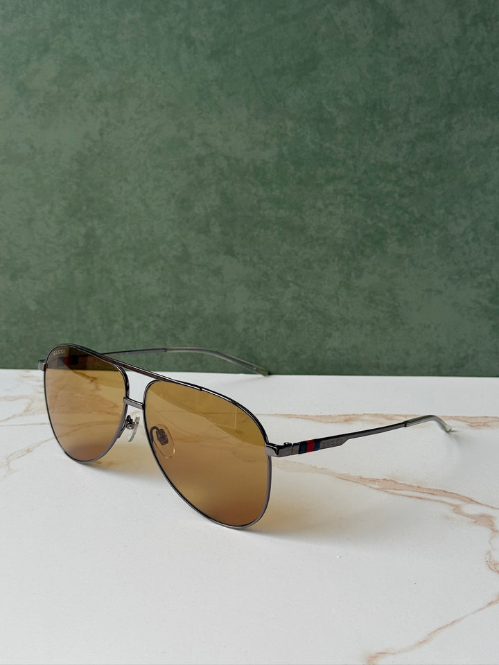Gucci GG1220S Gafas de sol de aviador con monograma verde