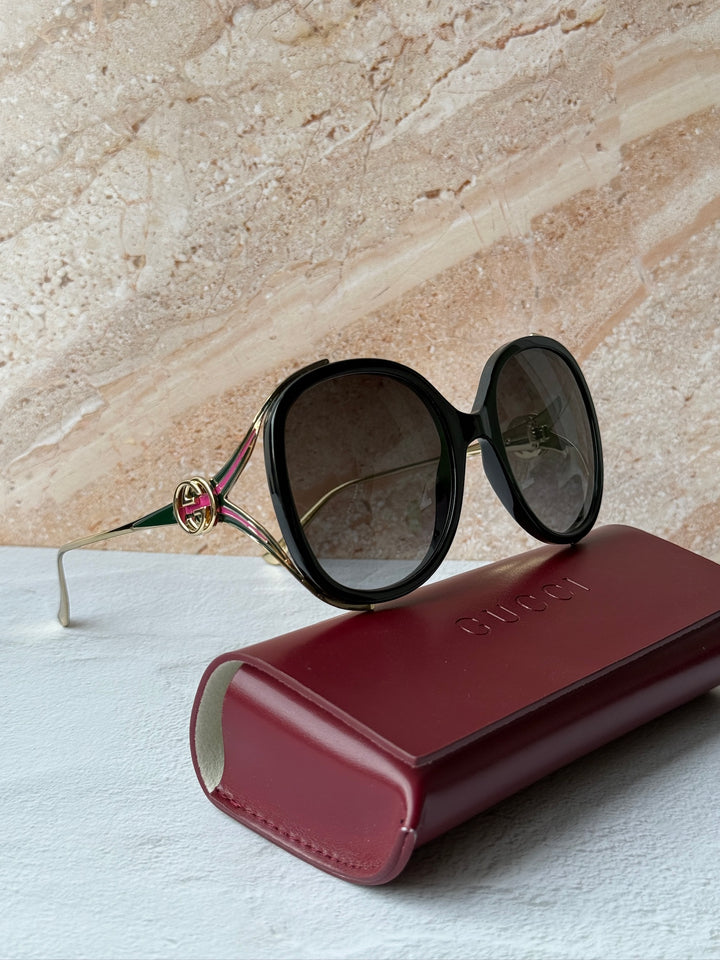 Gafas de sol con corte ovalado Gucci GG0226SK en negro rosa