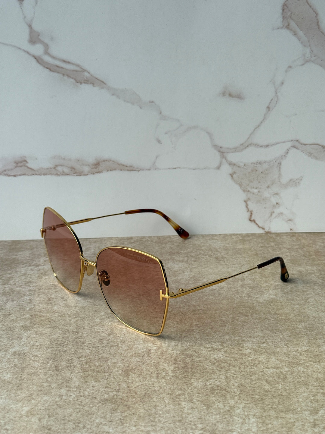Farah TF0951 gold-tone cat-eye sunglasses with amber-pink tinted lenses