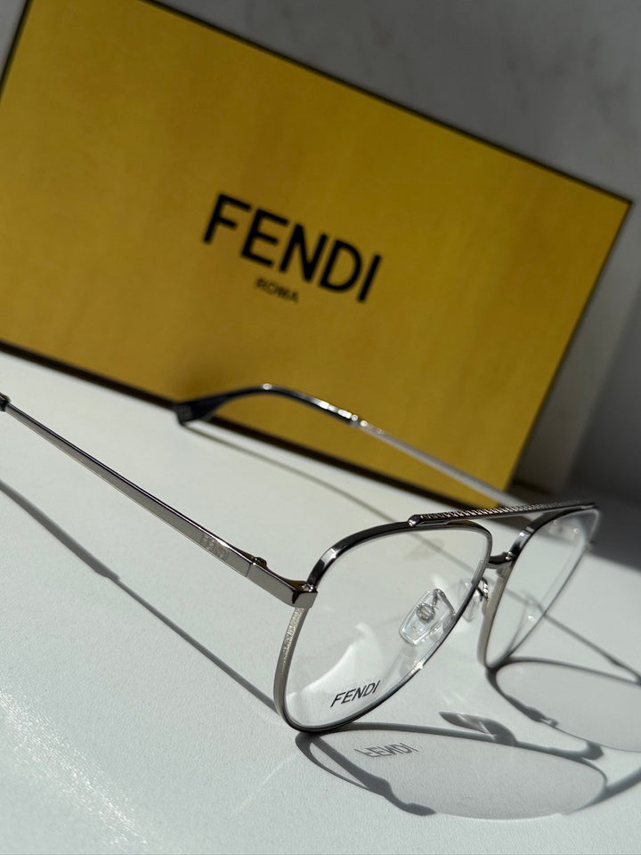 Silver pilot aviator eyeglasses with clear lenses and dark temple tips