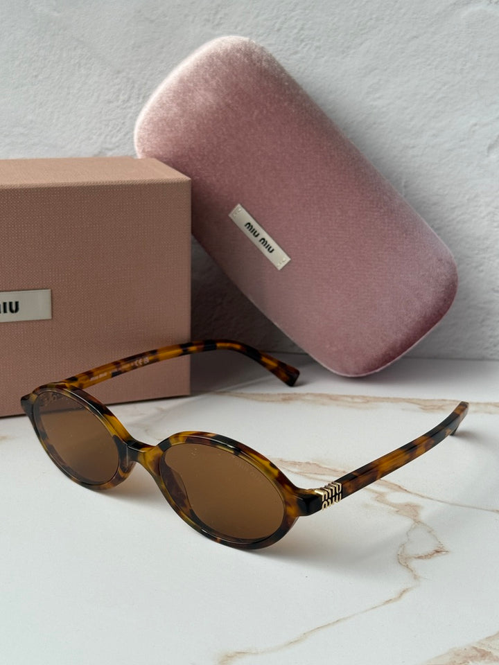 Miu Miu MU04ZS Light Havana Regard Sunglasses