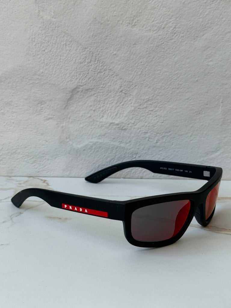 Prada Sport PS05ZS Sunglasses in Black Red Mirror