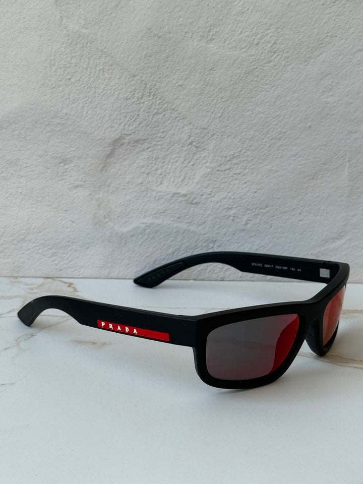 Prada Sport PS05ZS Sunglasses in Black Red Mirror