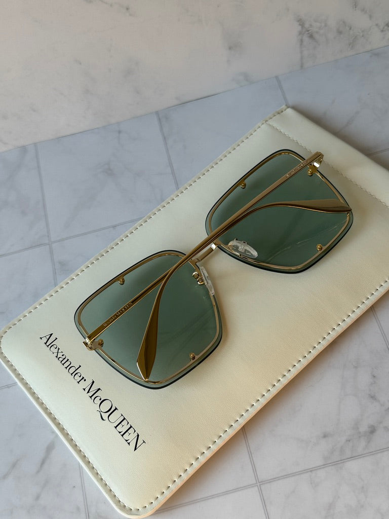 Oversized square sunglasses, green lenses with gold bridge and hinges