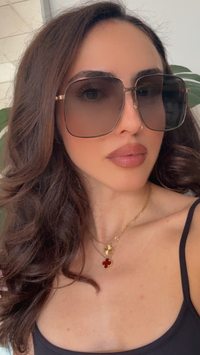 Gafas de sol negras cuadradas extragrandes con logo de abeja GG0394S de Gucci 