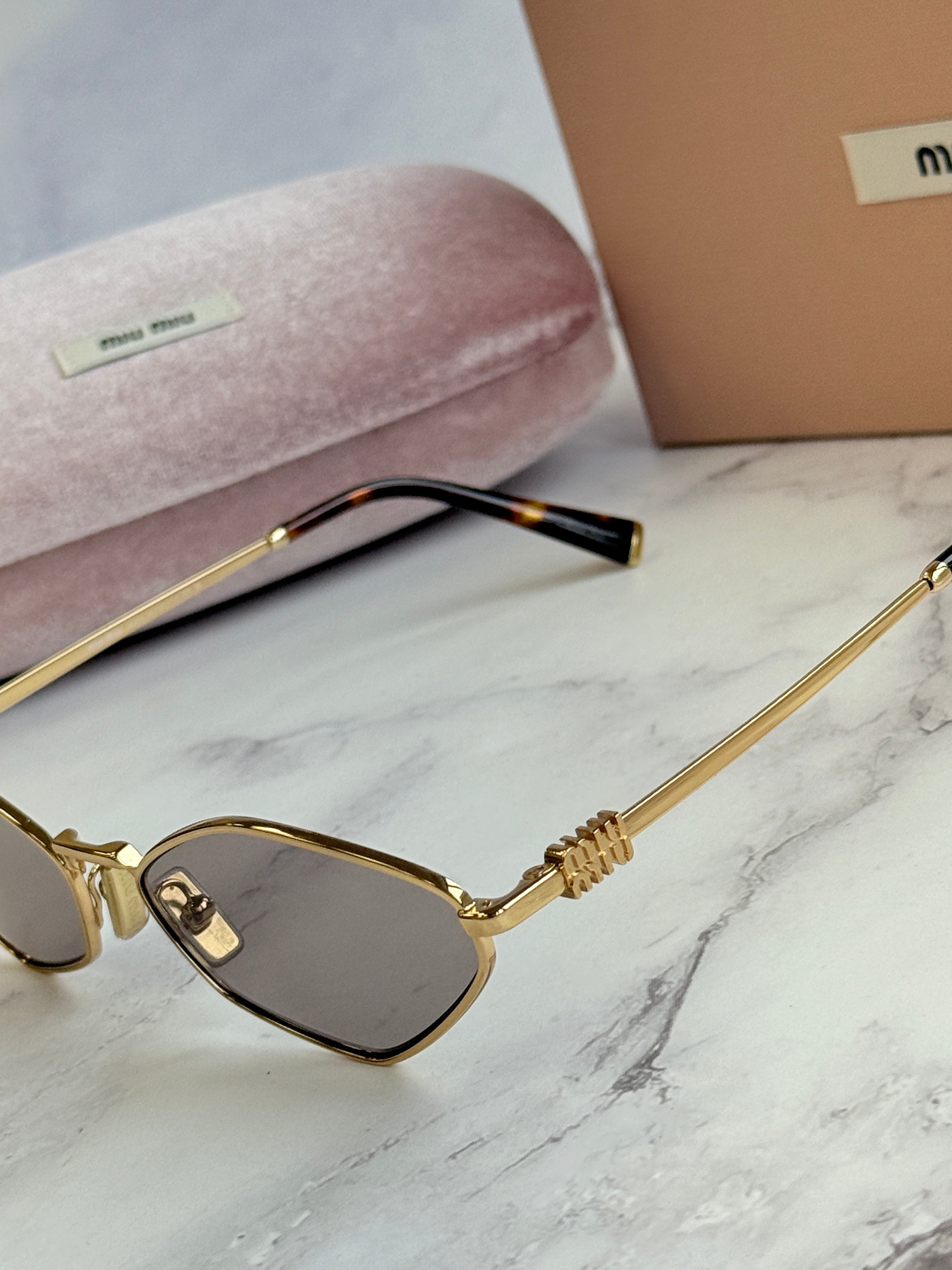 Miu Miu MU56ZS Sunglasses in Gold Light Purple | Designer Daydream