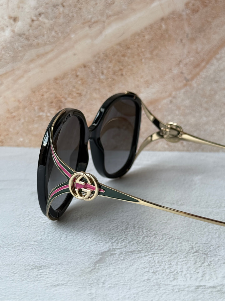 Gafas de sol con corte ovalado Gucci GG0226SK en negro rosa