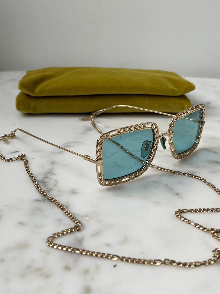 Gucci GG1112S Collar de cadena Gafas de sol rectangulares 