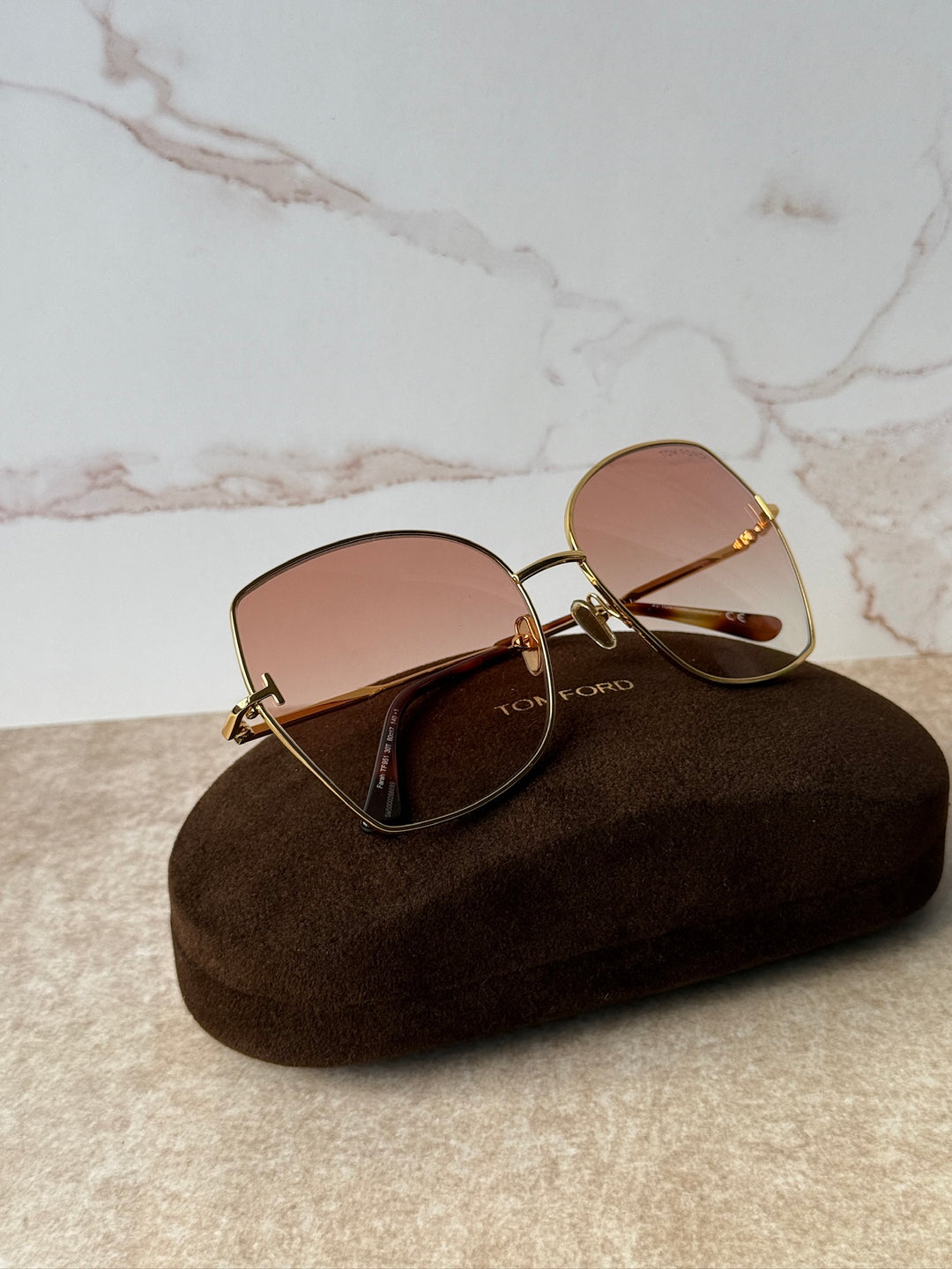 Farah TF0951 gold-tone sunglasses with pink tinted lenses, oval frames