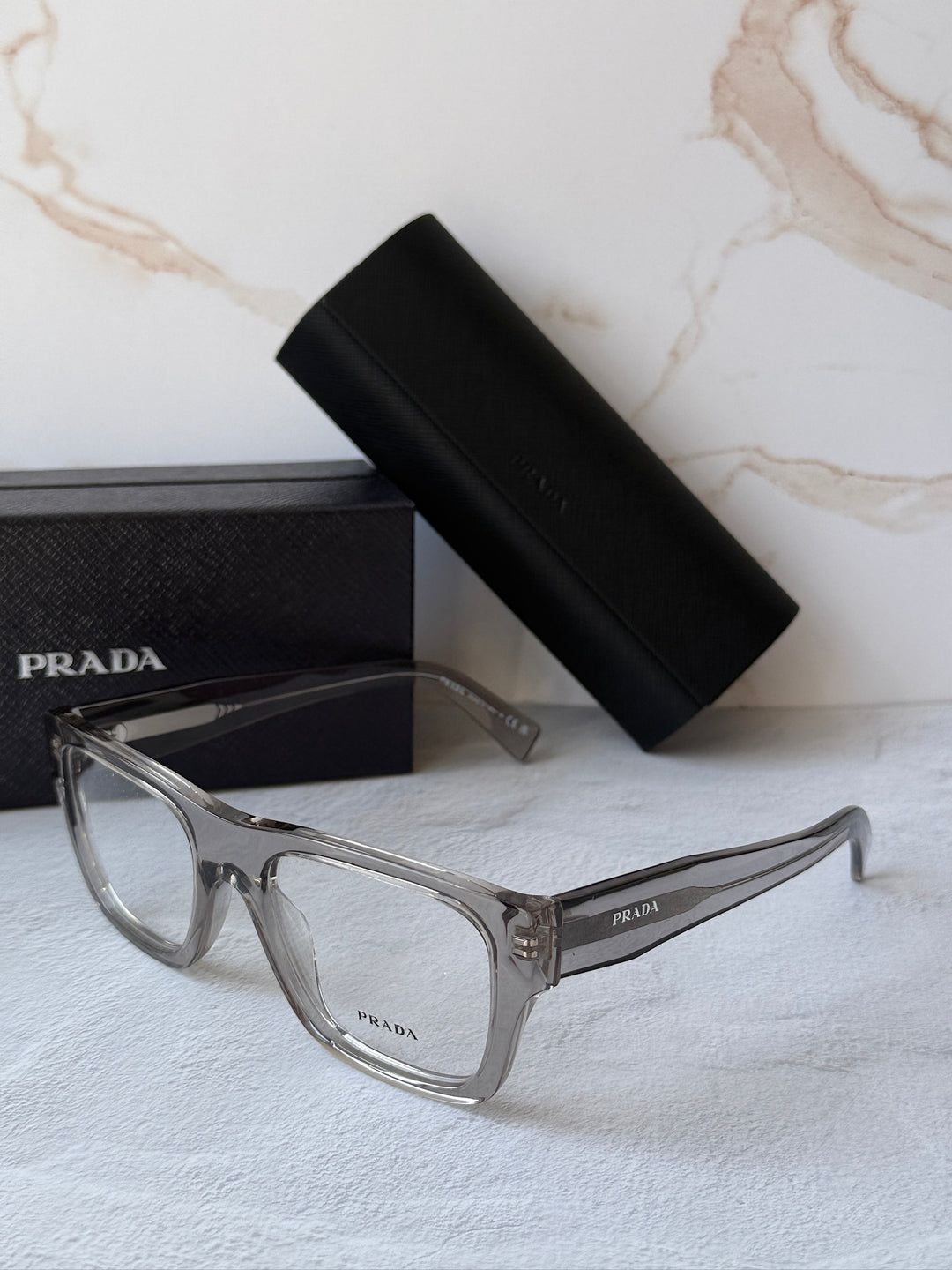 Prada PR C01V Square Eyeglasses Frames in Transparent Grey