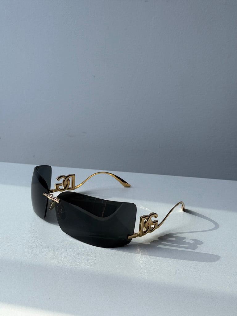 Dolce &amp; Gabbana DG2298B Gafas de sol con escudo negro cristalino 