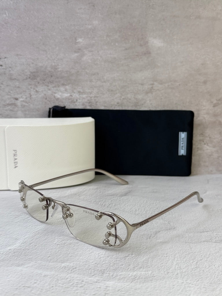 Prada PR C57S Rimless Sunglasses in Silver Bluelight