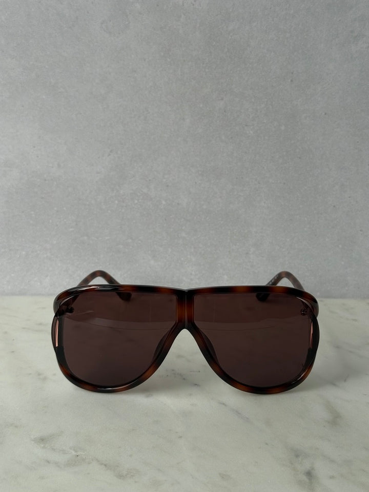 Aviator sunglasses with havana brown frames and dark tinted rectangular lenses
