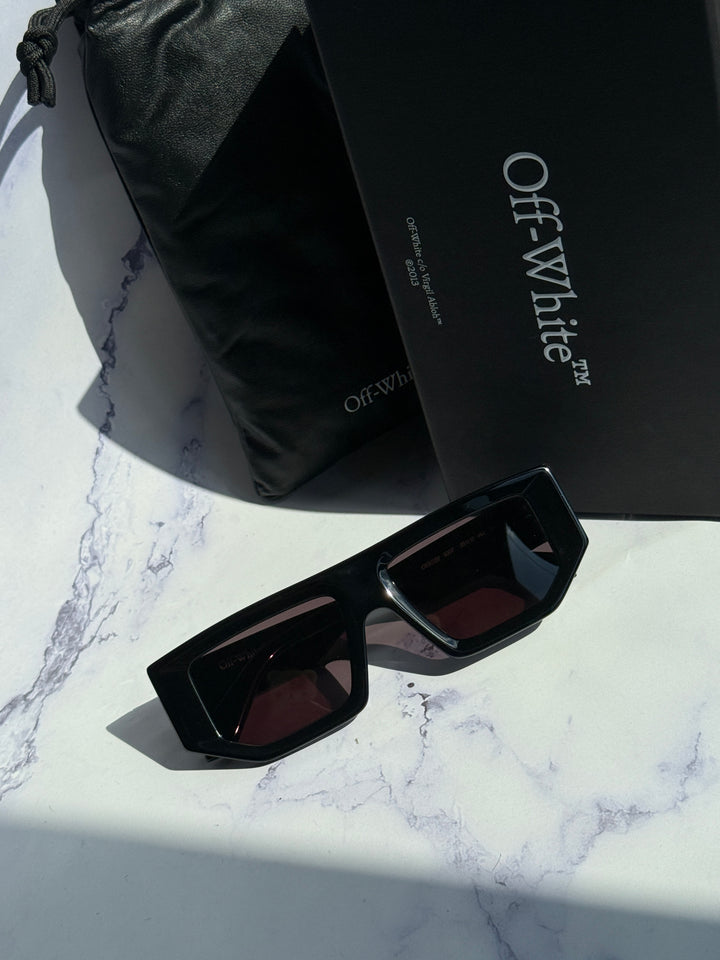 Off-White black square sunglasses with dark lenses, angled view