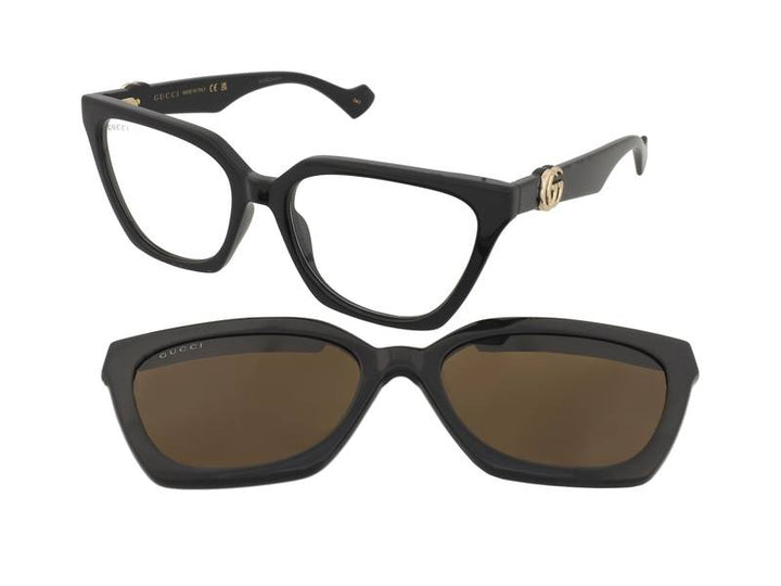 Black eyeglass frame with gold temple logo and clip-on sunglasses, brown lens shades