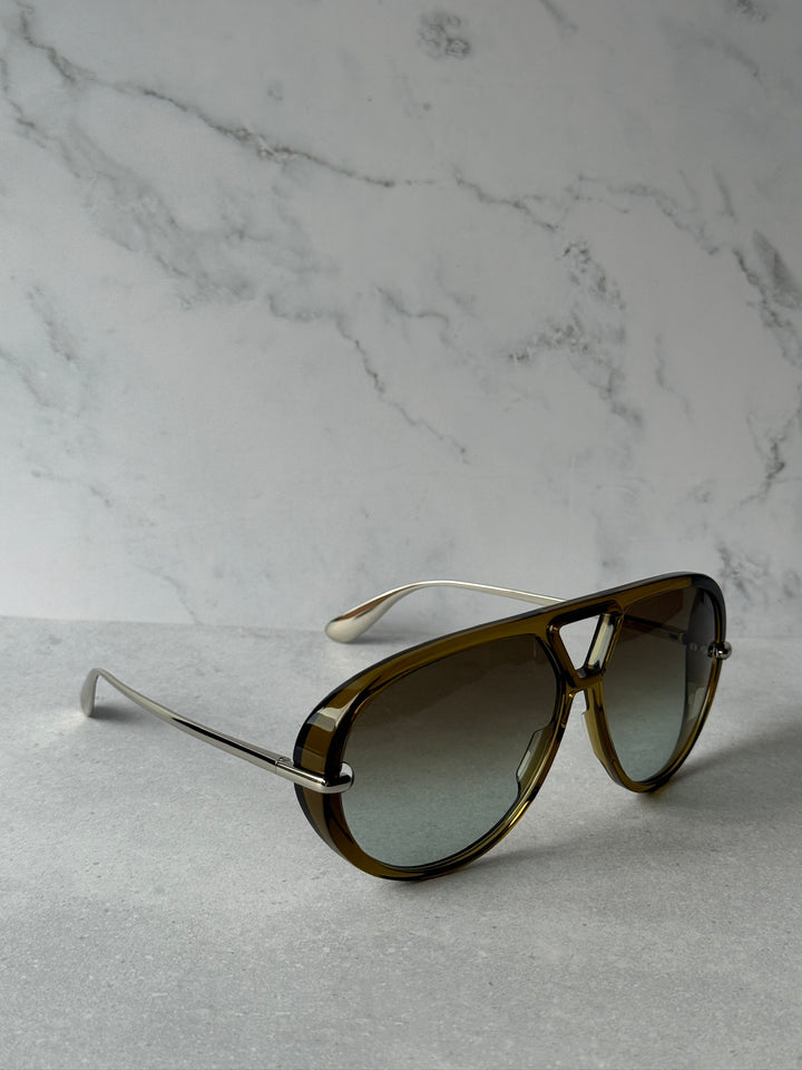 Khaki aviator sunglasses side view with brown tinted lenses and metal temples