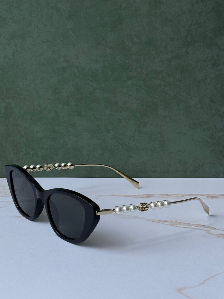 Gucci GG1257S Gafas de sol redondeadas con lentes marrones y rojos