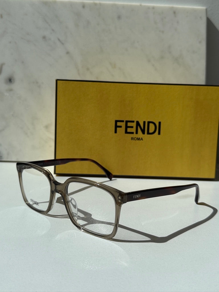 Unisex Fendi eyeglass frames, transparent brown plastic with rectangular clear lenses